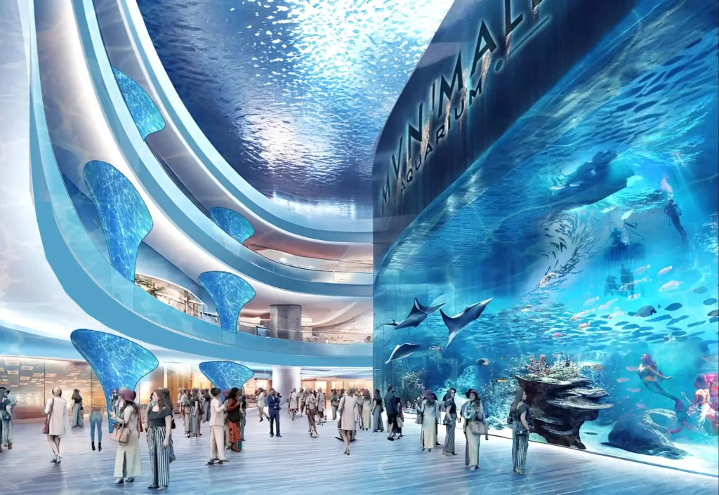 People walking beside gigantic aquarium